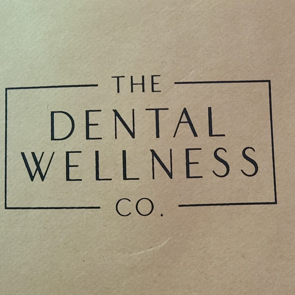 The Dental Wellness logo
